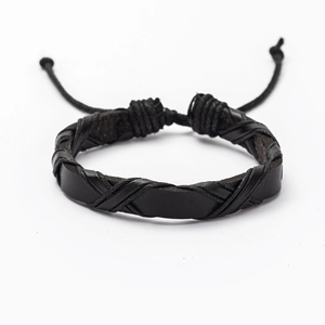 Detailed view of black woven leather bracelet with adjustable braided drawstring cord closure