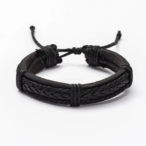 Detail of handcrafted multi-layer black braided leather bracelet with adjustable cord