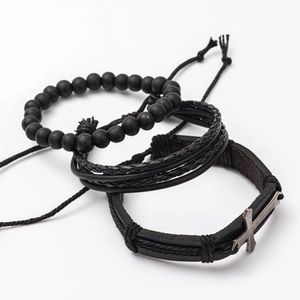 Set of three men's black leather bracelets featuring beads and metal cross charm detail