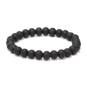 Men's punk DIY black matte beaded bracelet with 8-character alloy charm on white background