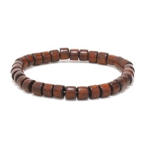 Retro brown wooden barrel bead bracelet with natural grain textures on white background
