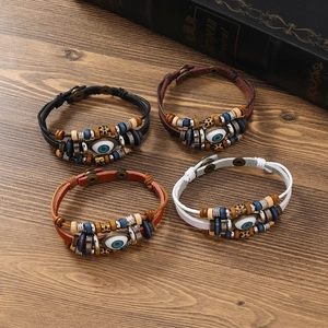 Retro multi-layer leather bracelets set with evil eye beads and wood charms