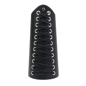 Punk style wide black leather wristband with double-row rivets and lace-up closure