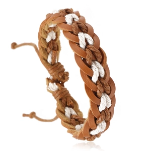 Macro detail of hand-woven leather and cotton cord bracelet with adjustable knot