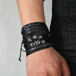 Men's punk multilayer leather bracelet with silver skull, stars and woven details