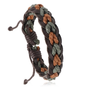 Handmade woven leather bracelet in vintage style with retro braided ropes and adjustable knot