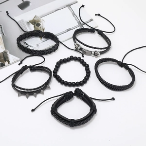 Men's 6-piece black punk style bracelet set featuring braided leather and metal spikes