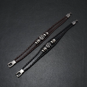 Men's multilayer braided leather bracelets with vintage silver dollar sign charms