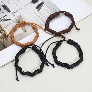 Lot de 4 bracelets vintage en cuir tressé noir, marron et bleu avec cordons réglables