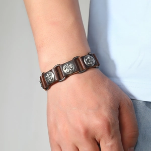 Vintage brown leather bracelet for men featuring retro silver fleur-de-lis metal charms