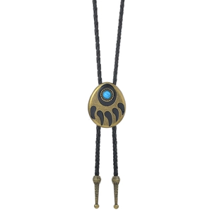 Detail of bear paw bolo tie pendant with turquoise stone and braided leather cord