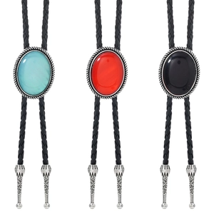 Vintage bolo tie set with oval turquoise and obsidian stones on braided leather cords