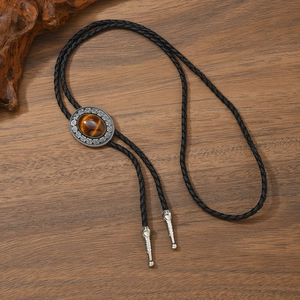 Western Bolo Tie with oval Tiger Eye stone on vintage silver Celtic knot carving