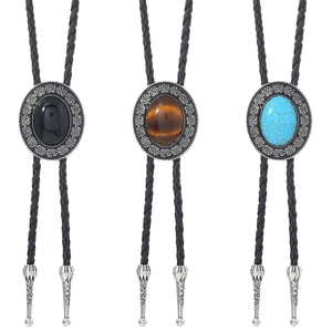 Three Celtic Bolo ties with turquoise, onyx, and tiger eye stones on black leather cords