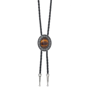 Celtic style western bolo tie with brown tiger eye stone and braided leather cord