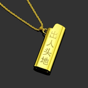 Detail of gold lighter-shaped pendant with Chinese engraving on a twisted rope chain
