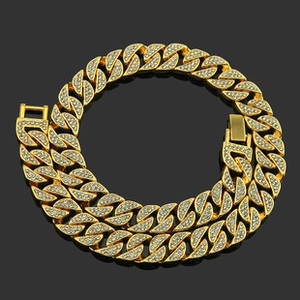 Close-up of gold cuban link necklace with iced-out pave diamonds and secure buckle