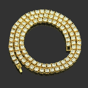 Detailed view of 13mm gold tennis chain necklace with square-set clear zircons