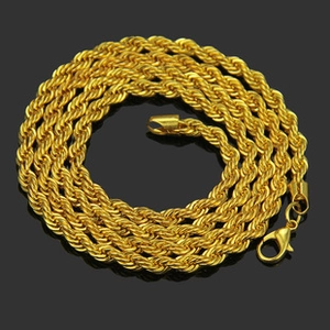 Detailed view of heavy golden rope chain necklace with a secure lobster clasp