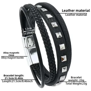 Detail view of multi-layer black leather bracelet with silver studs and magnetic clasp