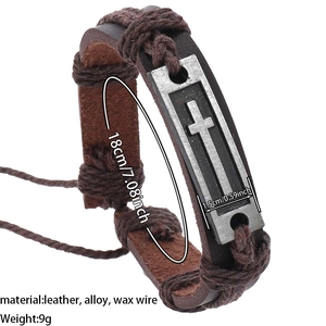 Detail of vintage braided leather bracelet showing alloy cross plate and dimensions