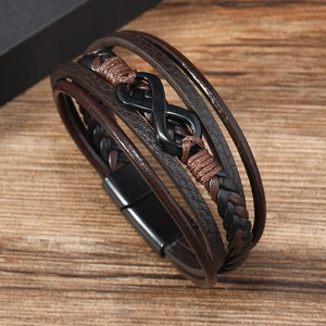 Men's multi-layer leather infinity symbol bracelet with magnetic clasp on wood