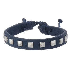 Detail of adjustable blue leather bracelet featuring silver square studs and knotted closure