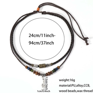 Detail view of adjustable braided necklace with wooden beads and musical note pendant