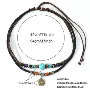 Detail view of turquoise beaded necklace with adjustable length and retro coin pendant