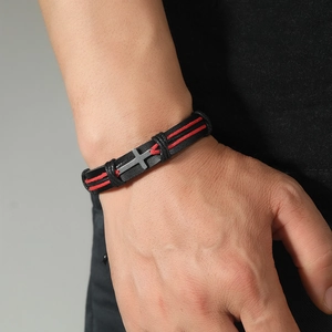 Men's hip hop leather bracelet with red stripes and silver cross pendant on wrist