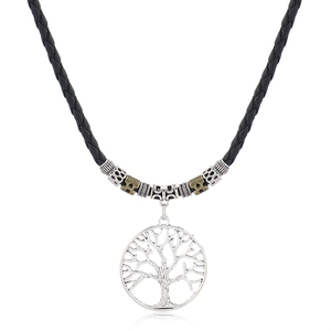 Detail of Tree of Life pendant necklace with black woven cord and silver alloy charm