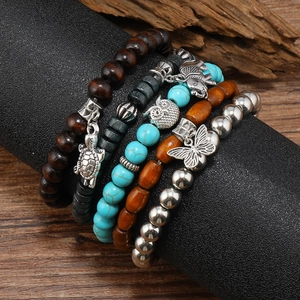 Ensemble de cinq bracelets en perles multicouches avec breloques éléphant et tortue style boho