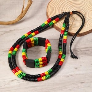 Detail of Rasta style wood bead necklace and bracelet set with red, yellow, green colors
