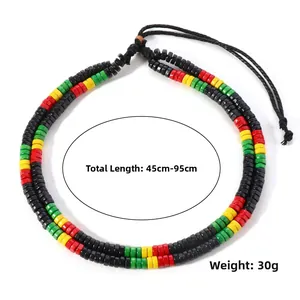 Detail of bohemian necklace with red yellow green wood beads and adjustable cord