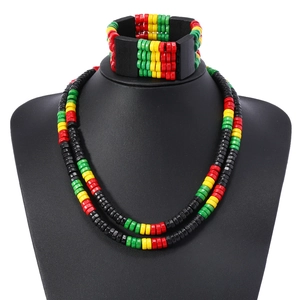 Bohemian Rasta color wooden bead necklace and bracelet set shown on a black bust model