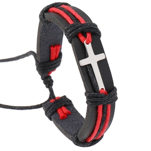 Detail of leather punk bracelet featuring a silver cross and red woven rope design