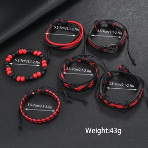Detail view of 6-piece woven leather bracelet set with tree of life charm and size info