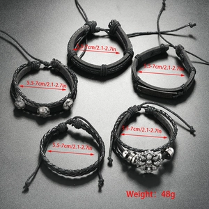 Detailed view of 5-piece multilayer leather skull bracelet set with size and weight specs