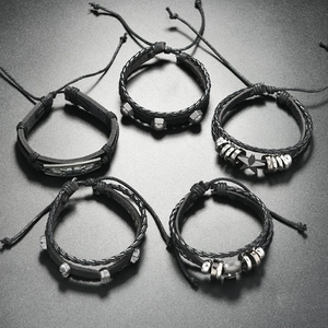 Five-piece punk leather bracelet set for men with metal skull and rivet charms