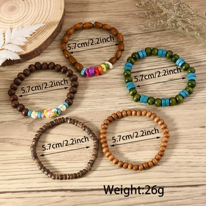 Detailed size view of five bohemian multilayer wooden bead bracelets with 5.7cm diameter
