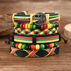 Detail of six-piece handmade woven leather bracelets with Tree of Life charm and beads
