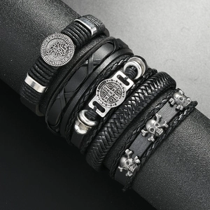 Men's punk leather bracelet set featuring skull cross and wolf head metal charms
