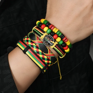 Detail of multi-layer Rasta bracelet with Tree of Life charm and wooden beads