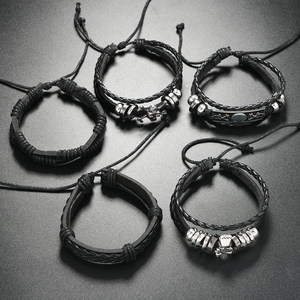 5-piece men's punk braided leather bracelet set with skull charms and adjustable cords