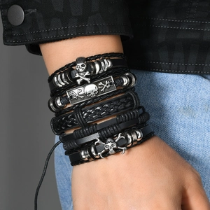 Men's multilayer leather bracelet set with woven bands and punk skull metal charms