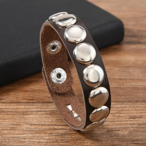 Punk style dark brown leather bracelet with silver metal rivets and snap buttons