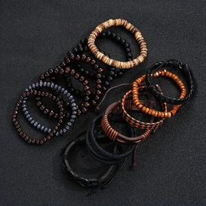 Detail of 13-piece beaded wood and braided leather bracelet set with infinity symbol