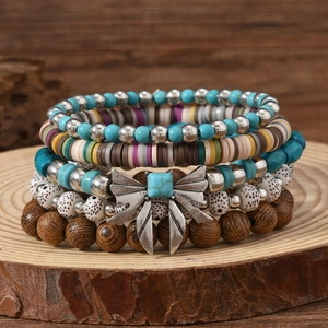 Boho-Mehrlagen-Armbandset mit Türkisperlen, Fimo-Scheiben und silbernem Schleifenanhänger