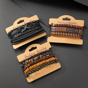 Detailed view of 12-piece men's beaded bracelets featuring leather and wooden beads