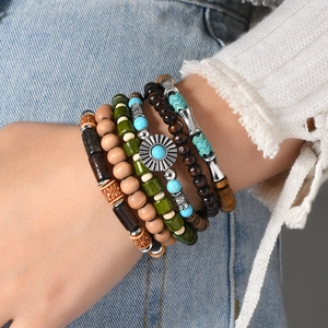 Bohemian multilayer coconut shell and turquoise beaded bracelet with sun pendant charms